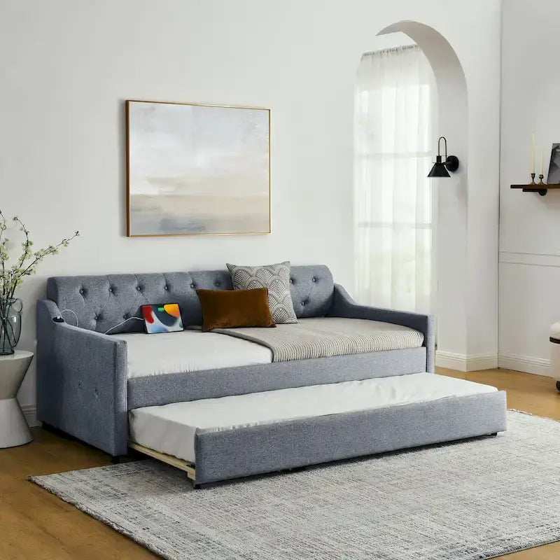 Banquette-lit tapissée avec lit gigogne escamotable et port USB