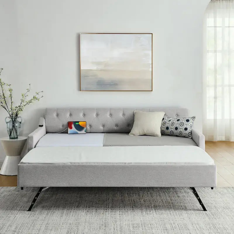 Banquette-lit tapissée avec lit gigogne escamotable et port USB